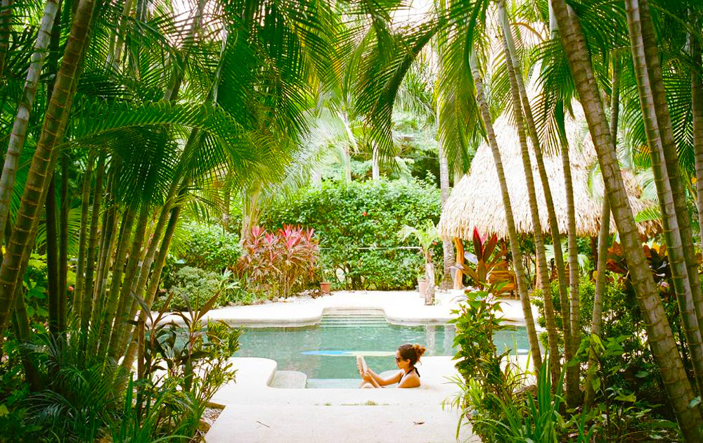 Reading Poolside at Corky Carroll's Surf Resort